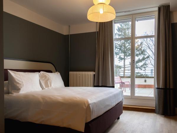 Boutique Hotel Waldhaus beider Basel : photo 1 de la chambre chambre double - côté rivière