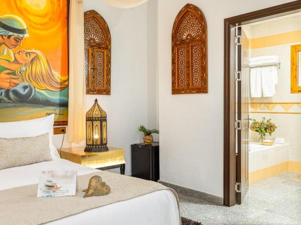 Hotel Plaza Del Castillo : photo 6 de la chambre suite avec jacuzzi