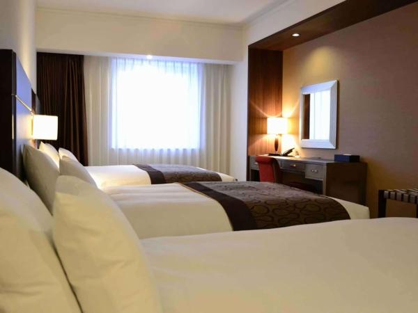 Ibis Styles Sapporo : photo 1 de la chambre chambre familiale deluxe avec lits jumeaux et 1 lit d’appoint - fumeurs
