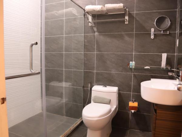 Kasih Sayang Hill Resort : photo 5 de la chambre chambre lit king-size deluxe