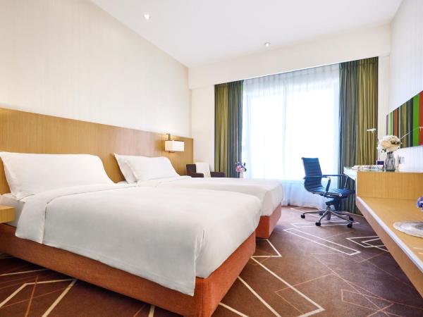 Vega Suites : photo 1 de la chambre chambre lits jumeaux standard - vue sur ville