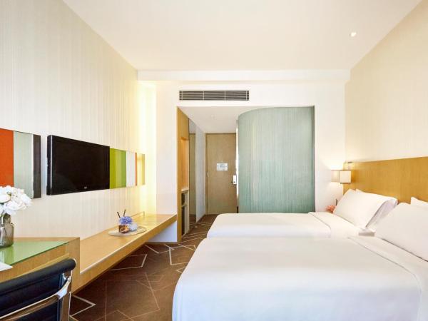 Vega Suites : photo 3 de la chambre chambre lits jumeaux standard - vue sur ville