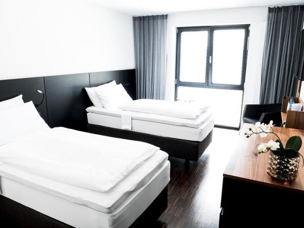 &REPEAT Köln Airport : photo 2 de la chambre chambre double ou lits jumeaux