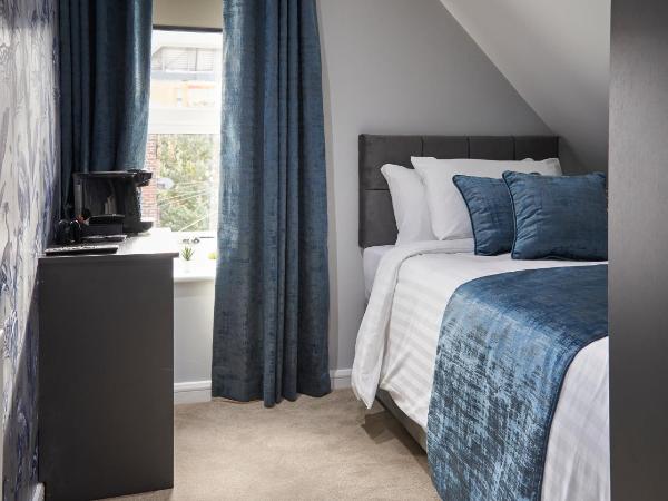 Home @ 2 Tancred Road : photo 2 de la chambre chambre simple avec salle de bains commune