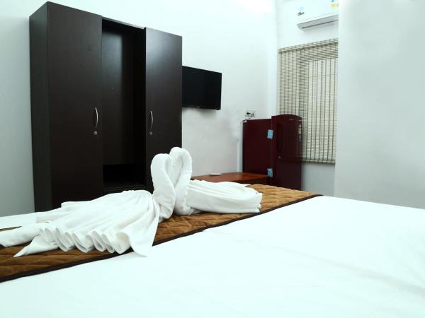 AWA Residency : photo 2 de la chambre suite deluxe avec lit king-size