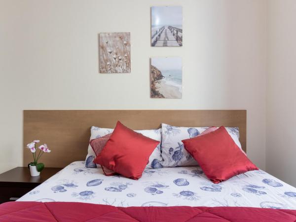 Ogliastra Apartment Rooms : photo 4 de la chambre chambre double ou lits jumeaux deluxe avec balcon