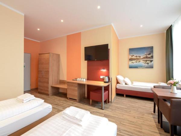 Alexander Business Hotel Hannover City : photo 1 de la chambre chambre triple