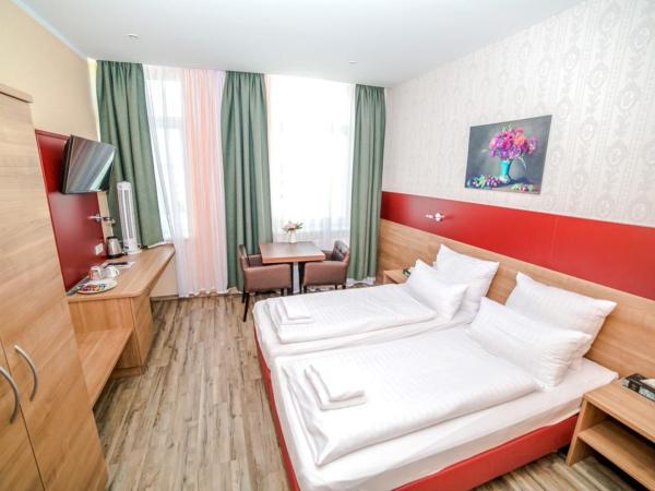 Alexander Business Hotel Hannover City : photo 7 de la chambre chambre triple