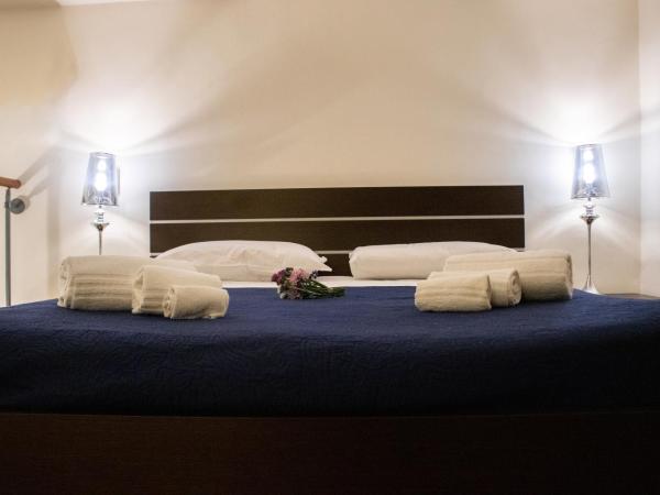 Apollo Suites : photo 10 de la chambre appartement en duplex