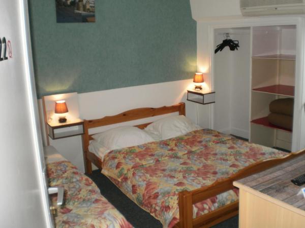 Hotel De La Gare : photo 2 de la chambre chambre triple
