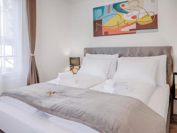 EH Apartments Jupiter : photo 7 de la chambre suite supérieure lit king-size