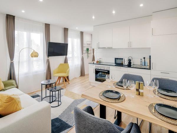 EH Apartments Jupiter : photo 1 de la chambre suite supérieure lit king-size