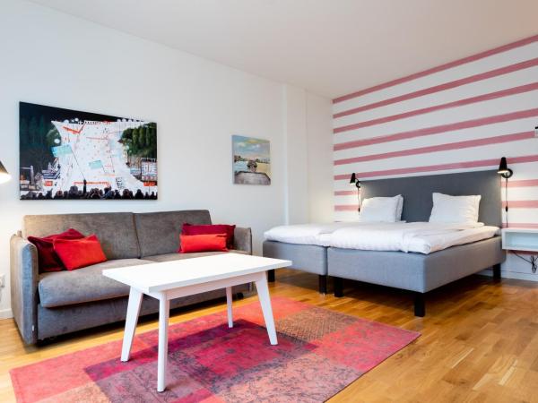 ApartDirect Hammarby Sjöstad : photo 3 de la chambre studio avec canapé-lit