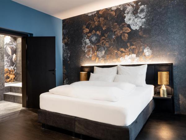 Aiola Living Graz : photo 2 de la chambre chambre double deluxe avec baignoire