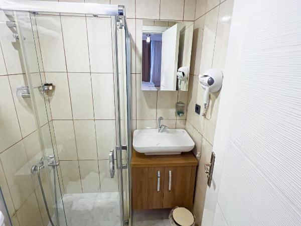 Helen Inn : photo 1 de la chambre chambre triple