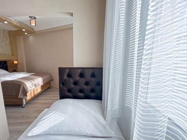 Helen Inn : photo 2 de la chambre chambre triple deluxe