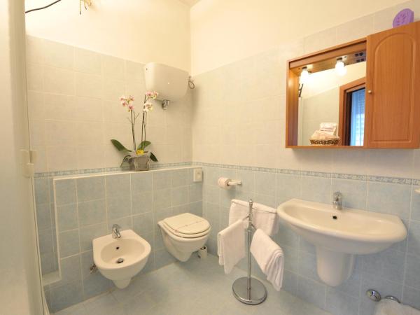 Hotel Astor : photo 3 de la chambre chambre quadruple