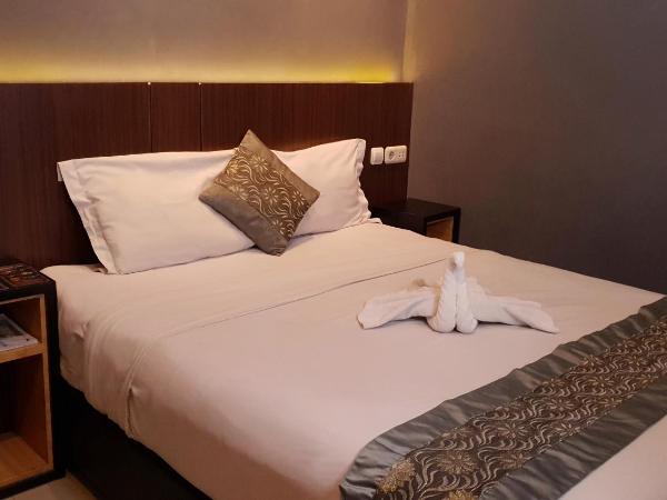 Sunrise Hotel Jogja : photo 1 de la chambre chambre deluxe double ou lits jumeaux