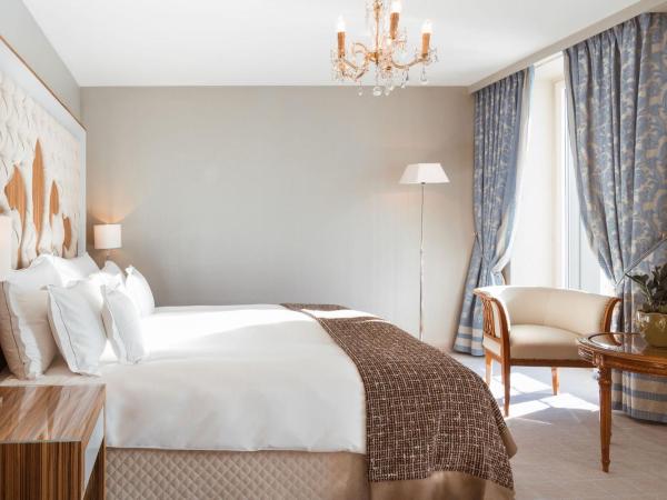 Carlton Hotel St Moritz - The Leading Hotels of the World : photo 2 de la chambre chambre double deluxe - vue sur lac
