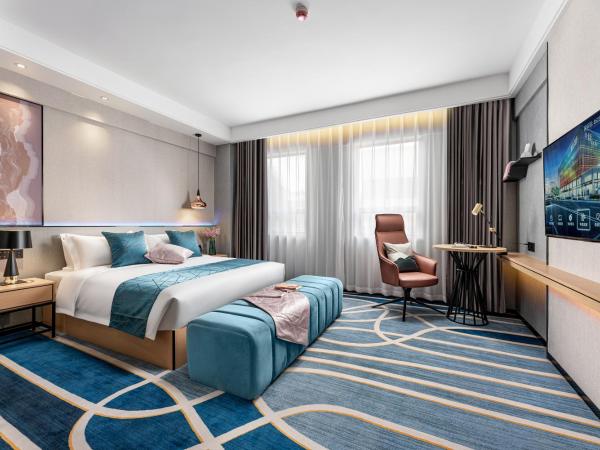 Jinshi Hotel : photo 1 de la chambre chambre lit king-size affaires