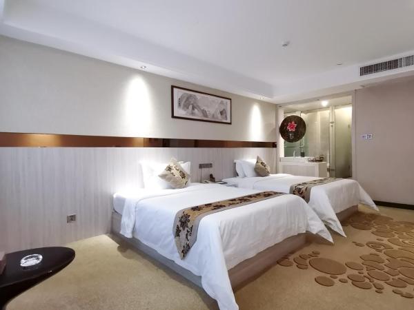 Paco Hotel Tianhe Coach Terminal Metro Guangzhou : photo 7 de la chambre suite exécutive