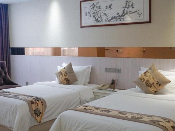 Paco Hotel Tianhe Coach Terminal Metro Guangzhou : photo 9 de la chambre suite lits jumeaux de luxe