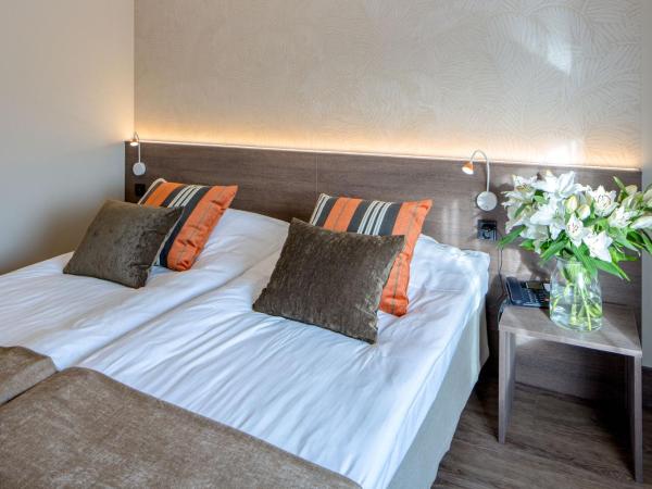 Holiday Club Turun Caribia : photo 2 de la chambre chambre double ou lits jumeaux standard