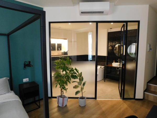 Piumaviola Beds & Apartments : photo 3 de la chambre suite avec jacuzzi