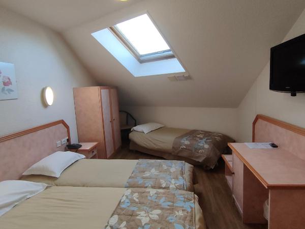 Hotel Novel Restaurant La Mamma : photo 2 de la chambre chambre triple