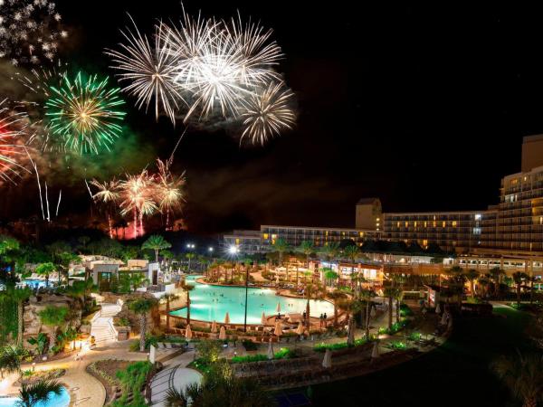 Orlando World Center Marriott : photo 4 de la chambre chambre lit king-size ou queen-size - vue sur piscine avec laser