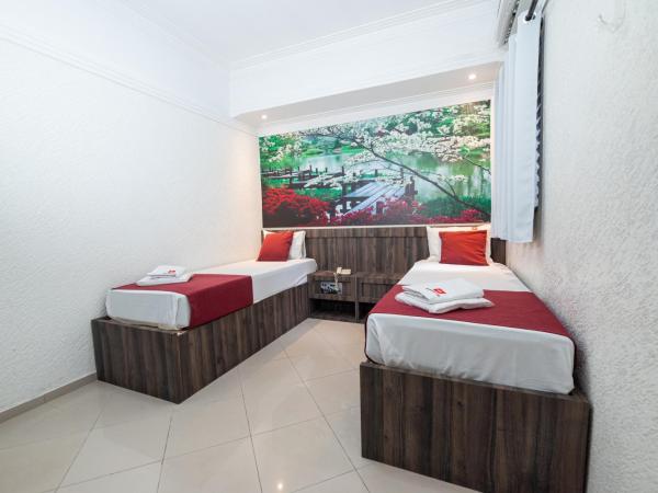 Expo Hotel : photo 1 de la chambre chambre lits jumeaux avec salle de bains privative