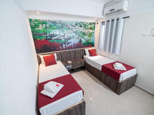 Expo Hotel : photo 2 de la chambre chambre lits jumeaux avec salle de bains privative