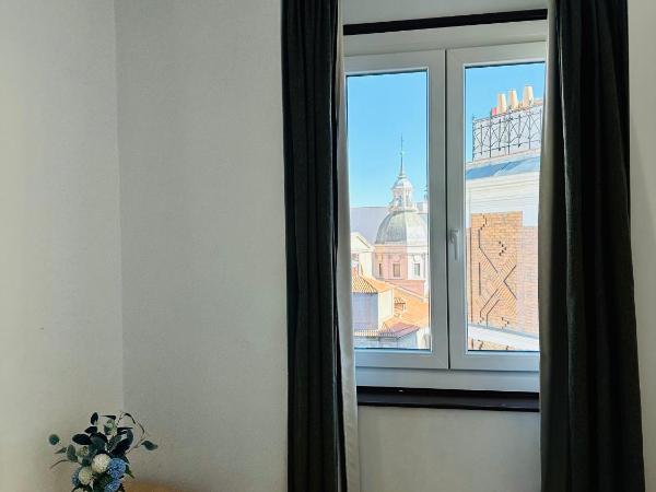 Hostal Abadia Madrid : photo 1 de la chambre chambre double supérieure - vue sur ville