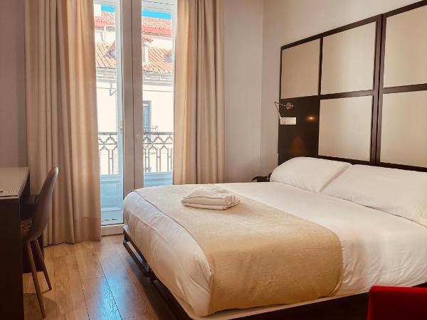 Hostal Abadia Madrid : photo 2 de la chambre chambre double avec balcon - vue sur ville