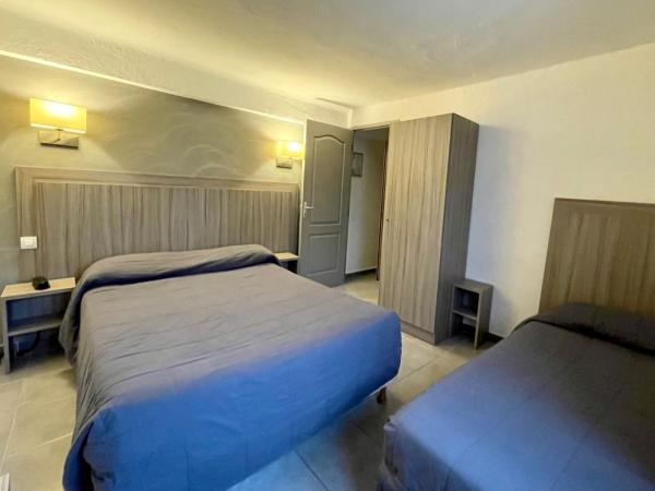 Hotel Les Palmiers En Camargue : photo 1 de la chambre chambre triple Économique