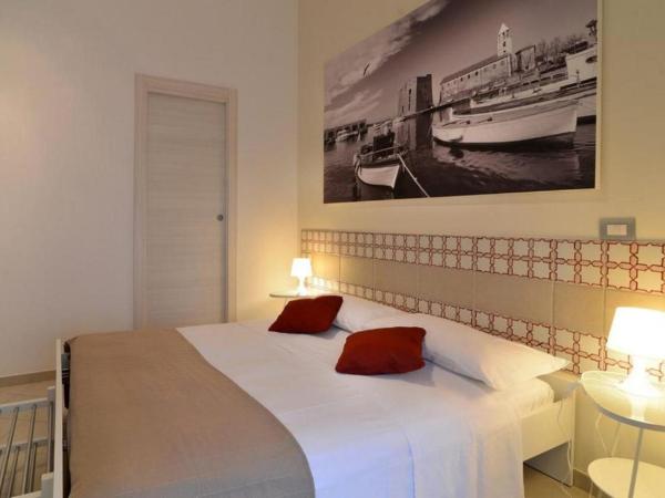 Santi e Saraceni Rooms : photo 9 de la chambre chambre double deluxe avec balcon
