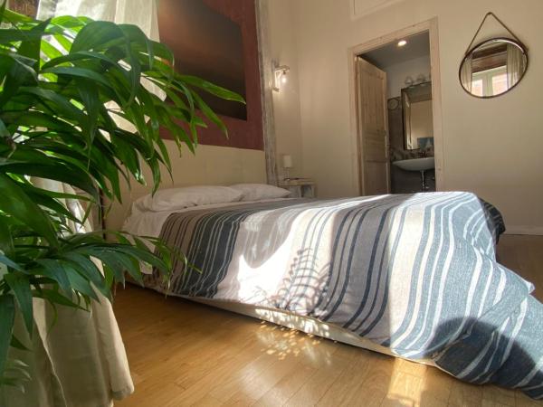 Corso 211 Beds & Suites : photo 2 de la chambre chambre triple avec salle de bains privative