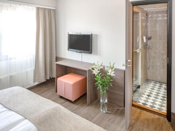 Holiday Club Turun Caribia : photo 4 de la chambre suite lit king-size