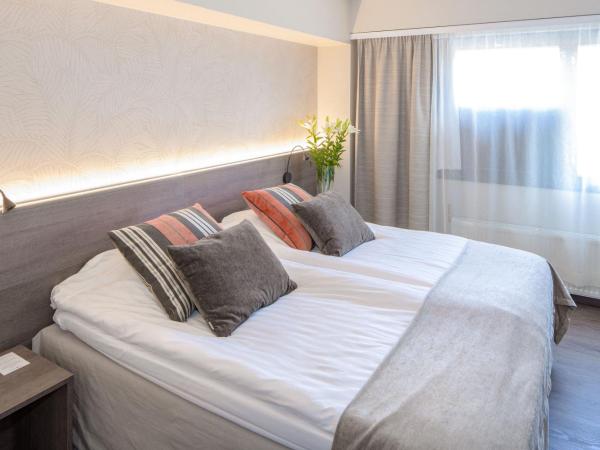 Holiday Club Turun Caribia : photo 2 de la chambre suite lit king-size