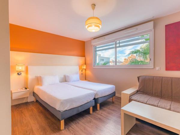 Appart'City Confort Montpellier Ovalie I : photo 1 de la chambre studio lits jumeaux