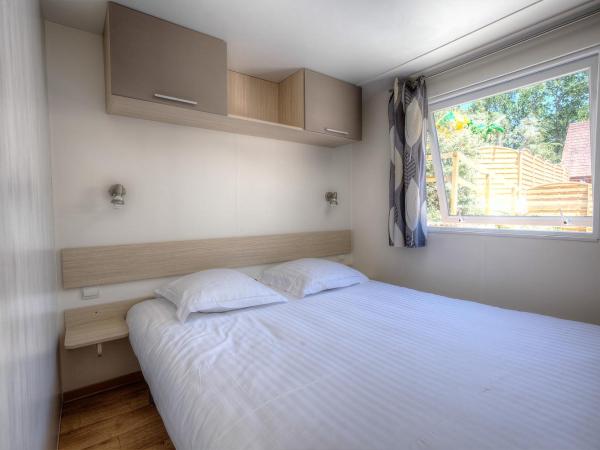 Les Chalets du Périgord : photo 2 de la chambre mobile home