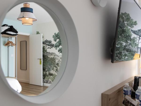 Logis Golfe Hotel : photo 3 de la chambre chambre triple