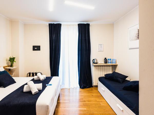 Gegix's Rooms Milano : photo 9 de la chambre chambre quadruple avec balcon 