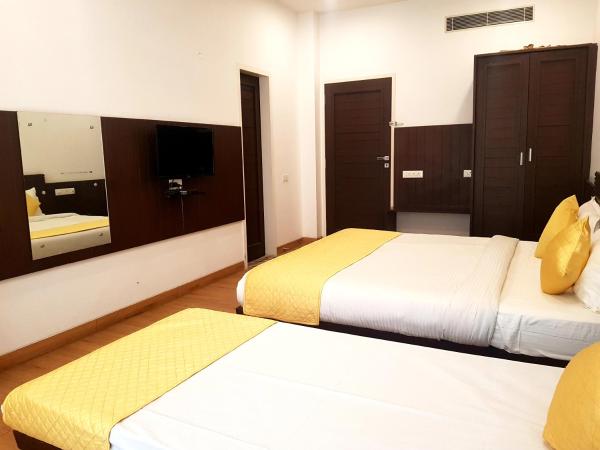 Hotel Vasudha Palace : photo 1 de la chambre chambre triple classique