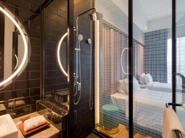 M Resort & Hotel Kuala Lumpur : photo 4 de la chambre hébergement lits jumeaux deluxe - vue sur parcours de golf