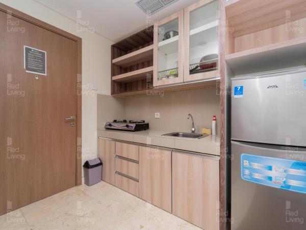 RedLiving Apartemen Puri Orchard - Prop2GO Home Tower Magnolia : photo 6 de la chambre studio