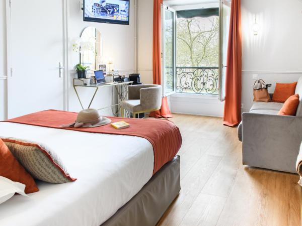 A l'Hôtel Des Roys : photo 10 de la chambre chambre quadruple supérieure