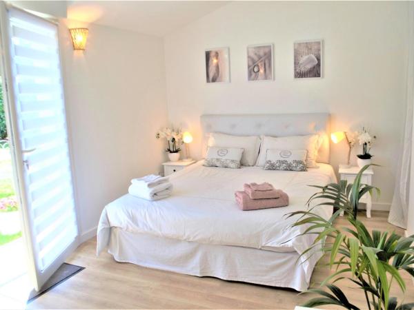 Chambre d'hôtes de charme MERBLEUESOLEIL : photo 8 de la chambre chambre quadruple premium