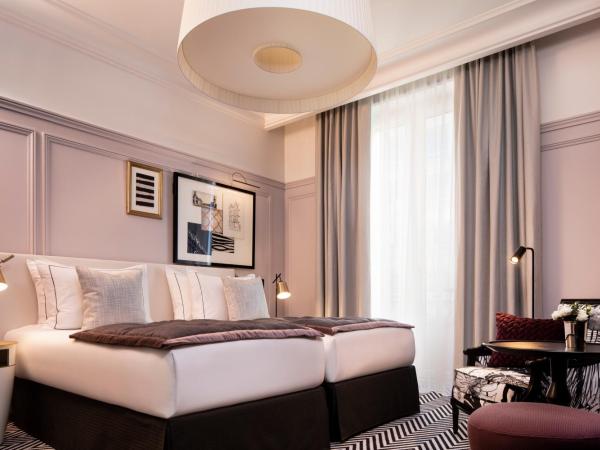 Le Damantin Hôtel & Spa : photo 1 de la chambre chambre double ou lits jumeaux deluxe avec accès à la piscine et à la salle de sport - vue sur tour eiffel