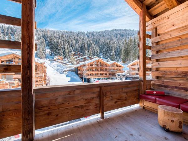 W Verbier : photo 1 de la chambre chambre fabulous avec 1 lit king-size et cheminée - vue sur montagne